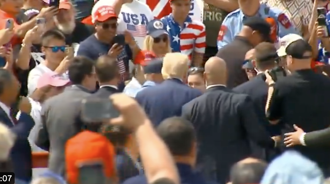 Trump Abruptly Stops Rally, Jumps Into Crowd In Urgent Moment