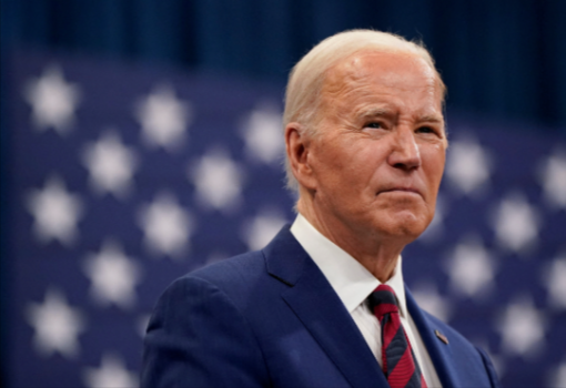 Watch: Smirking Biden Ignores Reporters Until Handler Escorts Him from Room